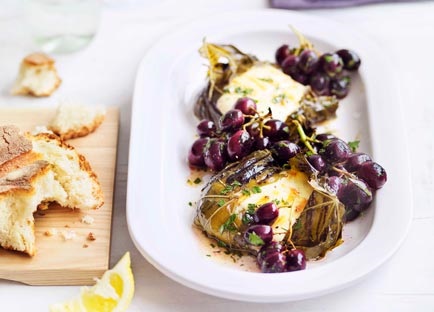 Vine leaf mozzarella parcels with anchovy, lemon and grilled grapes