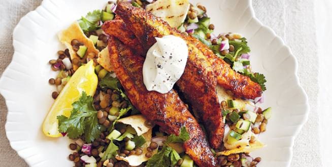Persian fish on lentil and pita salad