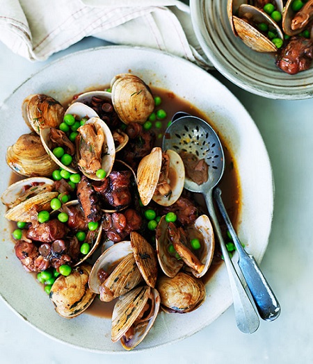 Octopus braised in red wine with clams and peas