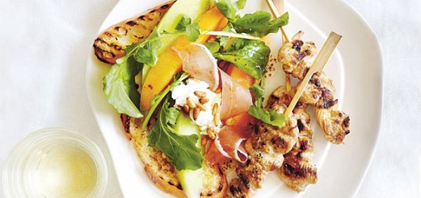Caramelised chicken skewers with parma ham and melon